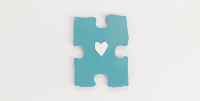 2 White and Blue Puzzle Pieces