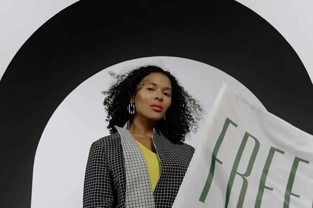 Woman in Black and White Checkered Blazer